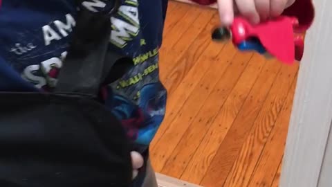 toddler has clever use for sling