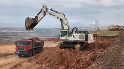 Liebherr 984 Excavator Loading Mercedes And MAN Trucks - Labrianidis Mining Works