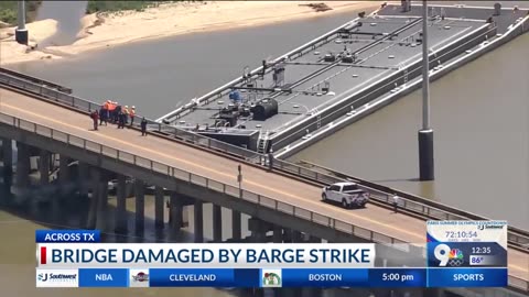 Barge hits Texas bridge, spilling oil and trapping workers on island