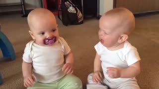 Funny twin babies have endless fight themselves