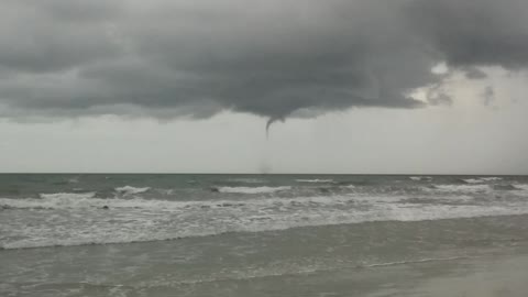 Baby water spout in Cocoa Beach, Florida