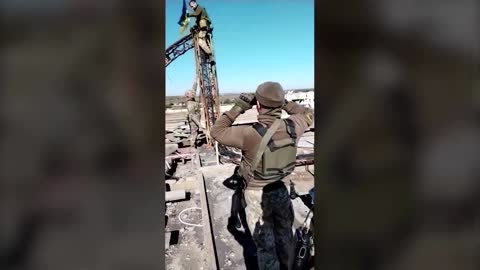 Video shows Ukrainian flag raised in retaken town