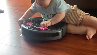 Ollie the Baby Loves Riding Our Roomba “Rhonda”
