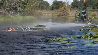 Sunken Airboat Gets Pulled to Shore