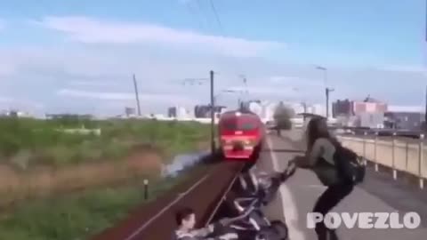 close calls- dude risks his life to save baby on train tracks heart stopping clip.