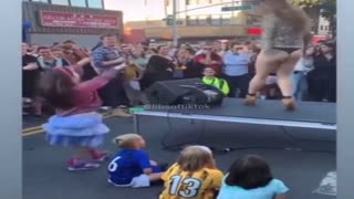 A drag queen teaches a child to twerk while shaking his near-naked butt in front of children
