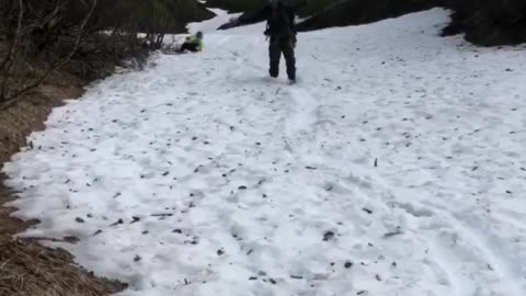 Boot-skiing down a ravine in Alaska