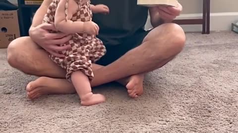 Cute baby who loves books