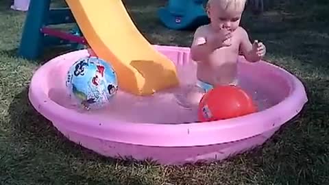 Identical Twin Boys: Splashing in the pool