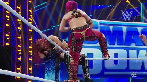 IYO SKY and Asuka battle inside a WWE ring,