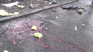 Damage and debris line streets after Kyiv TV tower hit