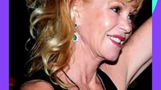 Melanie Griffith shows off a new tattoo covering her old one, a tribute to Antonio Banderas.