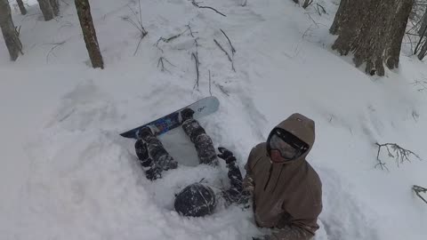 Snowboarder Wipes Out on Tree Well