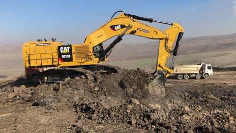 Caterpillar 6015B Excavator Loading Trucks With Two Passes - Sotiriadis Mining Works