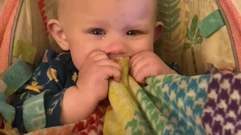 Baby babbling, crying while trying to take a nap.