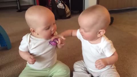 TWIN BABY FIGHT OVER PECIFIER