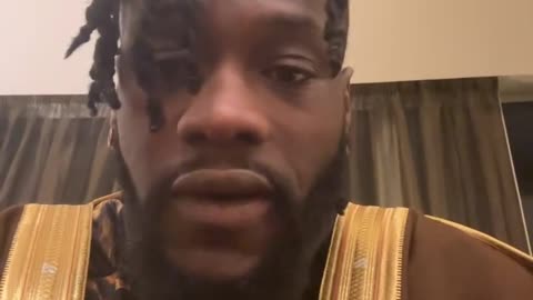 Deontay Wilder addressing the fans after losing to Joseph Parker
