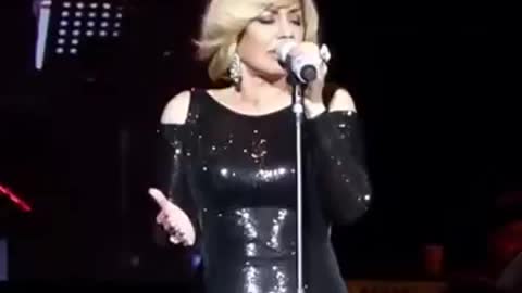Googoosh Performs a song in English