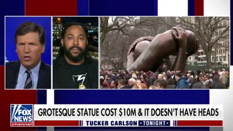 Seneca Scott reacts to the recently-unveiled statue dedicated to Dr. Martin Luther King Jr.