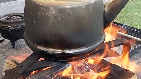 Cooking coffee at the campfire