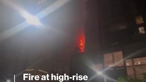 Fire rages in a high-rise building near the Burj Khalifa