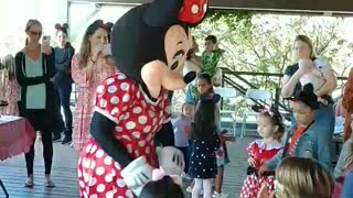 Hot dog dance at cane island with new pals at a birthday party with Mrs Mouse mascot minnie
