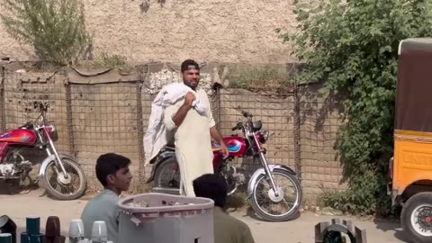 Throwing water on people | the guy tried to grab me😱| rickshaw man lost his slippers | joker pranks