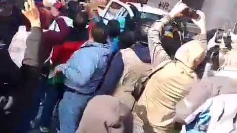 Angry Crowd breaks down the Door of the Mexico Presidential Palace