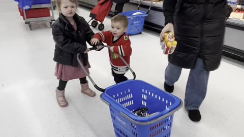 Kids Battle Over Grocery Basket