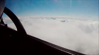 F16 Squadron over the clouds at sunset