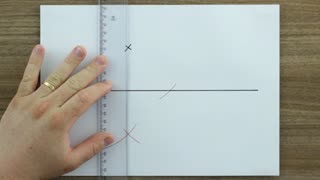 Traçar uma perpendicular a uma reta dada por um ponto fora da reta.