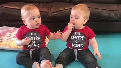 Hilarious identical twins fighting over Two binkies