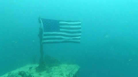 the US Flag flying on the USS Spiegel Grove