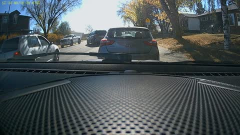 Dashcam Catches Vehicle Side-Swiping Parked Car