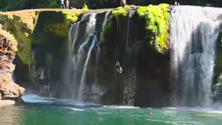 Epic cliff dive from stunning Washington waterfall