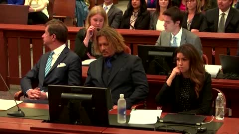 Depp's childhood friend tears up on witness stand