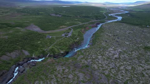 The Weirdest Waterfall in Iceland - Hraunfossar From a River Under a Lava Field