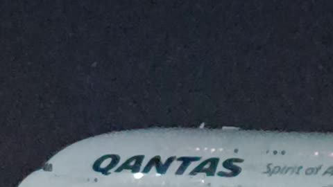 Qantas airways departing from Heathrow