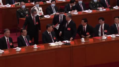 Former Chinese leader Hu unexpectedly leaves Congress closing ceremony _ AFP