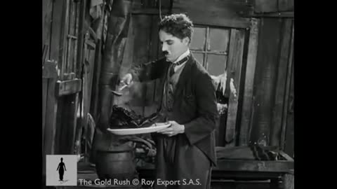 Charlie Chaplin Eating His Shoe - The Gold Rush