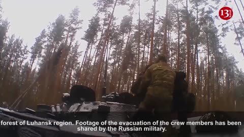 Russian servicemen whose military equipment were shot down are trying to save injured crew members