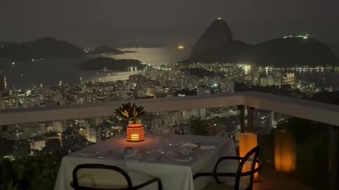 Dinner with a view of Rio de Janeiro at night.