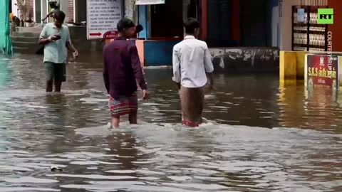 FLOODS IN INDIA - Locals Seen Fishing in Inundated Indian City