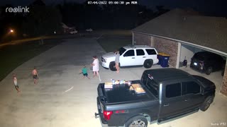 Firework Falls Over Nearly Hitting Family in Driveway