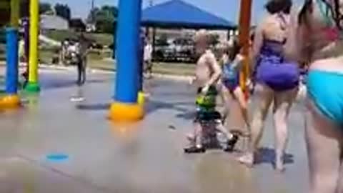 Negligent Babysitter Puts Baby Under Water Buckets at Splash Pad