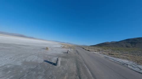 photographer professional Asian on top of the car shooting Masterpiece landscape and physics USA 2