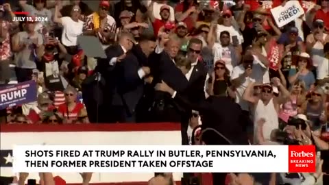 BREAKING NEWS Shots Fired At Trump Rally Former President Pumps Fist As Rushed Off Stage