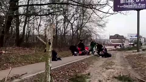 Journalists and residents run from shelling in Irpin, Ukraine