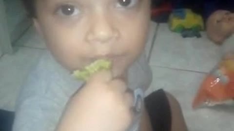 child eating Brocolis