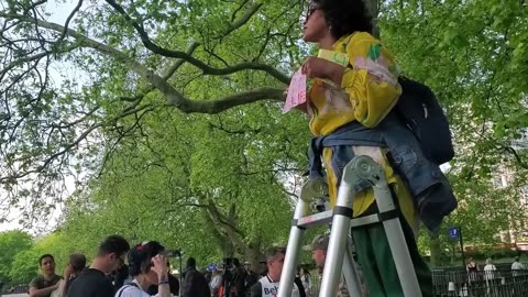 Speakers Corner - A Man Throws His Drink At Shalini As She Is On The Ladder